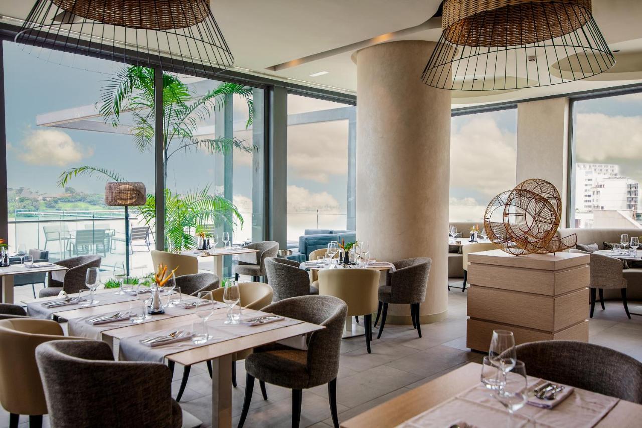 Noom Hotel Abidjan Plateau 外观 照片 The restaurant