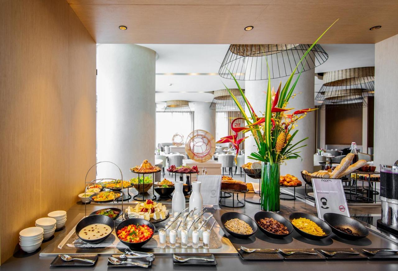 Noom Hotel Abidjan Plateau 外观 照片 A buffet at a hotel