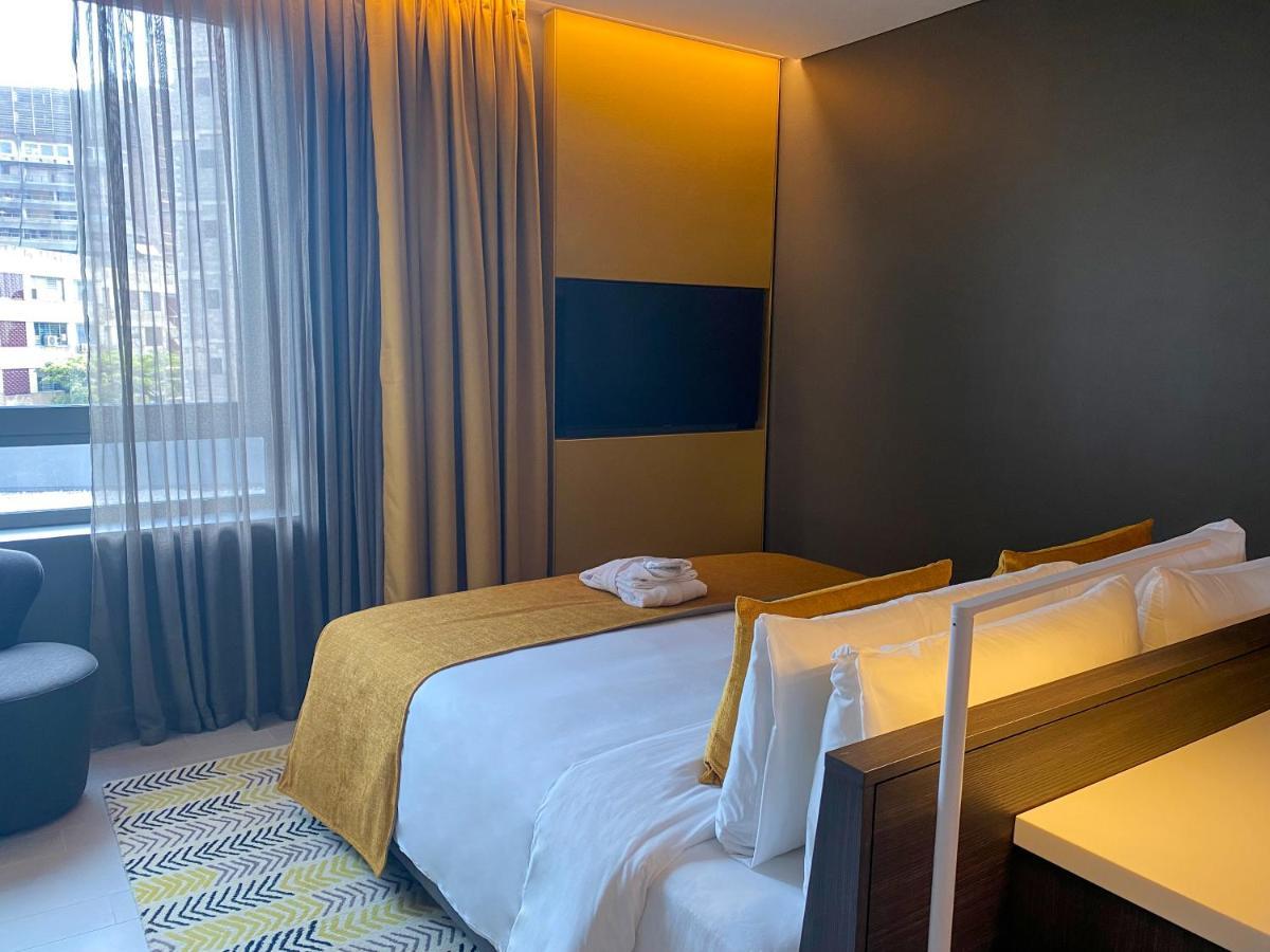 Noom Hotel Abidjan Plateau 外观 照片 A room at the hotel